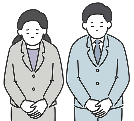 頭を下げる人の画像